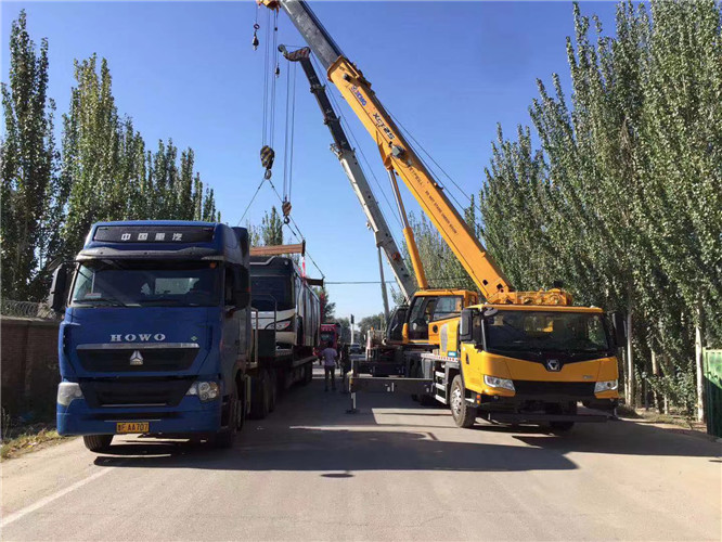 堆龙德庆区“省油又稳当”—— 吊车的 “智能节能” 技术